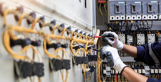 Professional Electrician technician working in River Heights, UT